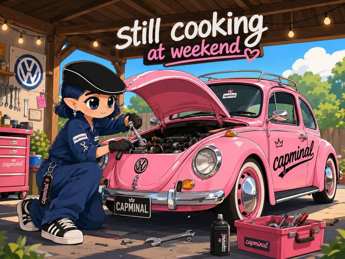 The image features a cartoon girl who appears to be fixing a pink Volkswagen Beetle. The girl is wearing a hat and has her hands on the hood of the car while working on it. In the background, there are two other cars visible - one being a Volkswagen and another being a different make or model. A caption below the image reads "V2 is coming soon with new feature, bring new use case for $CAP, pls be patient".