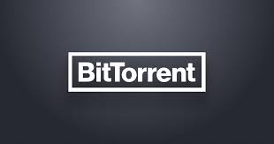 The image displays the BitTorrent logo in white text on a gray background, visually anchoring a caption describing the company's evolution from peer-to-peer file sharing technology toward a broader on-chain economy.