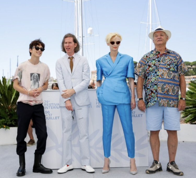Four people pose together at the 74th Cannes Film Festival, standing in front of a step-and-repeat banner displaying "74e FESTIVAL INTERNATIONAL DU FILM" and "08 17 JUILLET" against a backdrop of sailboat masts.

Note: The image appears to be a photograph from the Cannes Film Festival photocall, but I cannot identify the specific individuals pictured based on their appearance. The accompanying post text and tag references don't match the visual content of this image, which shows a film festival event rather than anything related to crypto/Web3 companies like Zerion or Zapper.