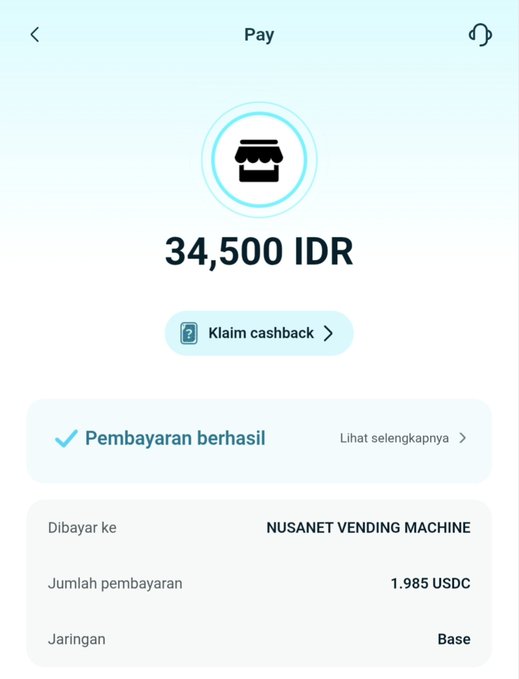A mobile payment confirmation screen showing a successful payment of 34,500 IDR (1.985 USDC) to NUSANET VENDING MACHINE on the Base network, with a 'Klaim cashback' option and 'Pembayaran berhasil' (payment successful) status.