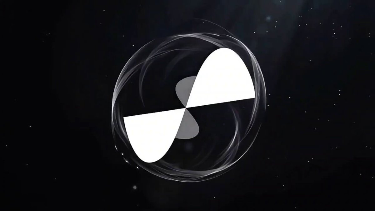 The image features an abstract design with a white circle containing two black lines, which are symmetrically positioned at the center of the frame. The background consists of a dark color that contrasts with the white elements, making them stand out prominently. The image does not provide any specific information about the content or context related to the post.