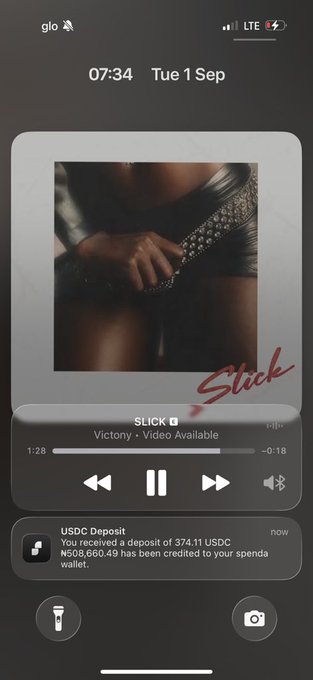 A phone screenshot dated Tuesday, September 1st at 7:34 AM displays a music player showing the song "Slick" by Victory with 374.11 USDC (₦508,660.49) deposited to a Spenda wallet, playfully responding to the "how much have you made this month" prompt with the receipt as proof of earnings.