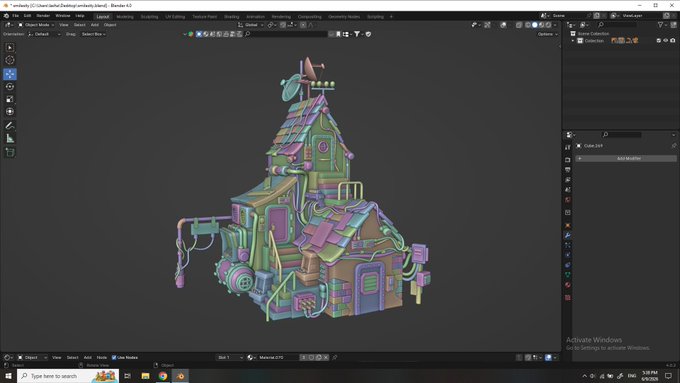 A screenshot of Blender 3D software showing a colorful, stylized 3D model of a fantasy house with purple, green, and brown elements on a dark gray workspace.