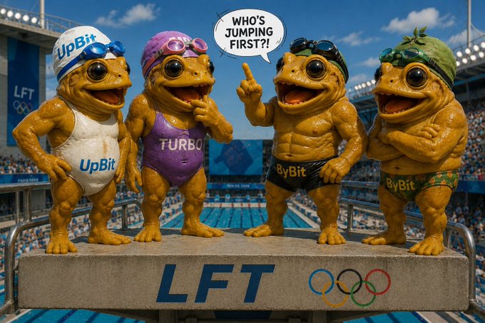 The image features four frog statues, each wearing swimsuits and goggles, standing on a platform with the words "LFT" written on it. The text suggests that these frog characters are participating in an Olympic diving event or competition. The first frog is positioned at the left side of the platform, while the other three frogs are located towards the right side. They appear to be posing for a photo, possibly as part of a promotional campaign related to the Olympic Games and swimming events.