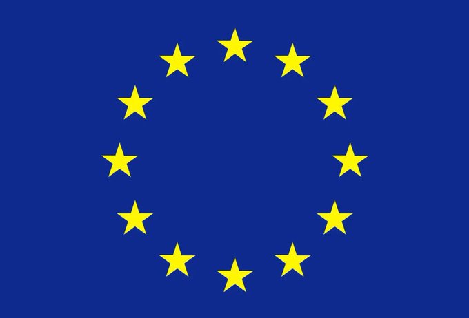 The flag of the European Union, featuring twelve golden five-pointed stars arranged in a circle on a blue background.