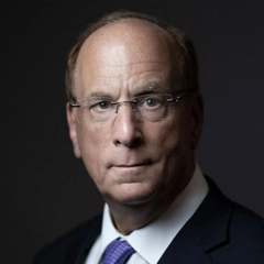 A professional headshot shows a middle-aged man with short hair, glasses, a dark suit, white shirt, and purple tie against a dark background. The image likely depicts a BlackRock executive or executive chairman, relating to the news of BlackRock's significant $83.79 million Ethereum purchase.