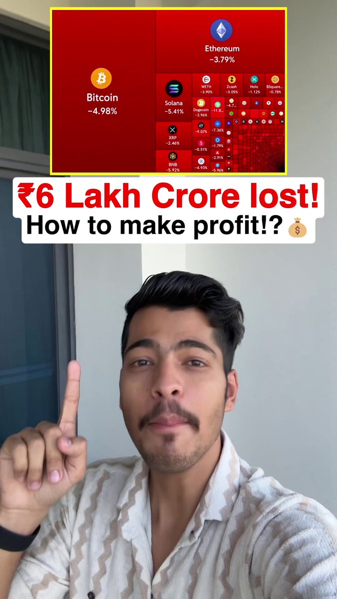 In the image, there is a man with a beard pointing at something, possibly showing off his finger or an object he is talking about. The focus of the image seems to be related to cryptocurrency markets as the title suggests "Lakh crore lost!" This caption appears to provide insights into why Bitcoin has crashed so hard and what caused this decline in value within a short span of time. The presence of a laptop near the man could possibly indicate that he is referencing relevant information or statistics during his discussion about the situation, though it's unclear if there are other elements present in the image directly related to Bitcoin markets.