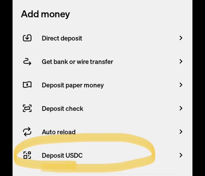 The image shows a screenshot of an app called CashApp, which allows users to send and receive money through various methods such as direct deposit or wire transfer. The app's main feature is the "Direct Deposit USDC" button, which enables users to add money directly from their bank account using the USDC method. This feature is highlighted in yellow text on a white background, making it easy for users to identify and utilize when needed.