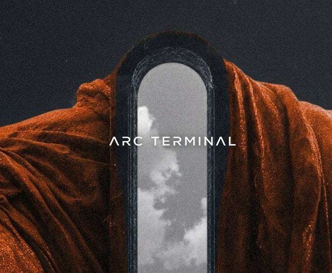 A surreal image showing an arched mirror set against a dark, draped fabric background, with the text 'ARC TERMINAL' overlaid in the center.