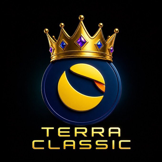 The official logo for 'TERRA CLASSIC' cryptocurrency, featuring a dark blue circular emblem with a yellow crescent moon design, topped with a golden crown adorned with purple and blue gems.
