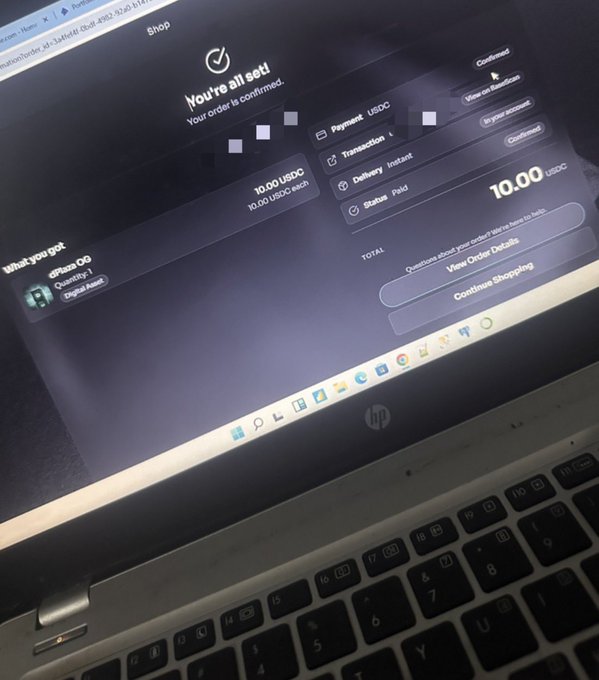 A laptop screen displaying a completed order confirmation page showing 'You're all set! Your order is confirmed' for a 10.00 USDC payment for an item called 'ePizza GO' (Quantity: 1), with a 10.00 USDC total.