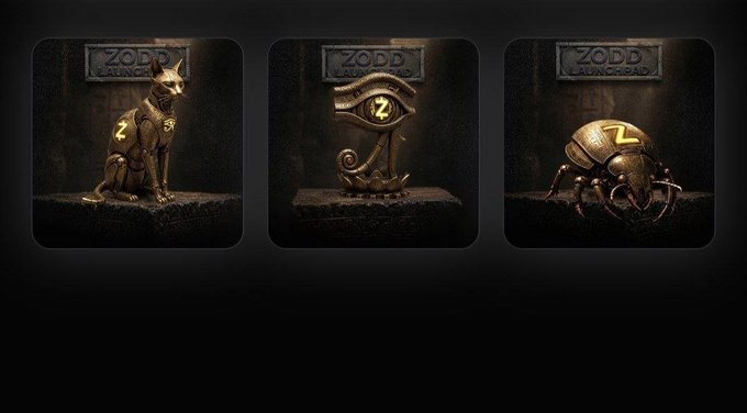 Three stylized, Egyptian-themed 3D-rendered images labeled "ZODD LAUNCHPAD", depicting a jackal-headed figure, an Eye of Horus symbol, and a scarab beetle, each with the "Z" logo.