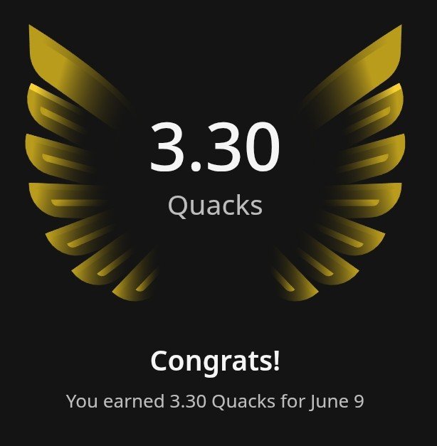 The image shows a post on social media with an award for Quacks. It features a gold-colored bird's wing design, which is the main focus of the image. The text below the wing reads "Congratulations! You earned 3.30 Quacks for June 9". This message congratulates the user and highlights their achievement in terms of Quacks.