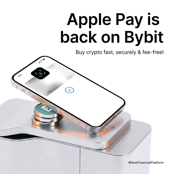 The image features an iPhone with a wallet app installed, which allows users to buy Bitcoin from Bybit. The phone is placed on top of a metal box that has a green coin slot on its side. The text displayed on the image reads "Apple Pay is back on Bybit. Buy crypto in just a few taps using your Apple device. Buy now: i.bybit.com/1bxabYsu". This suggests that users can easily purchase Bitcoin from Bybit through their Apple Pay app, making it convenient and accessible for everyone.