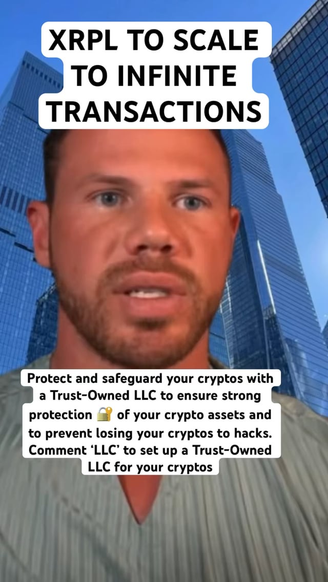 The image features a man wearing a grey shirt with white text that reads "XRPL to scale to infinite transactions". The background of the image shows tall buildings, suggesting an urban setting or cityscape.