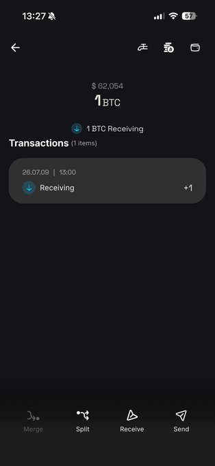 Screenshot of a Bitcoin wallet app showing a $62,054 balance of 1 BTC with an incoming transaction dated 26.07.09 at 13:00.