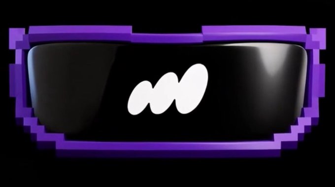 A pixel-art style purple sunglasses or visor graphic with a black lens and a white stylized 'M' or logo in the center.