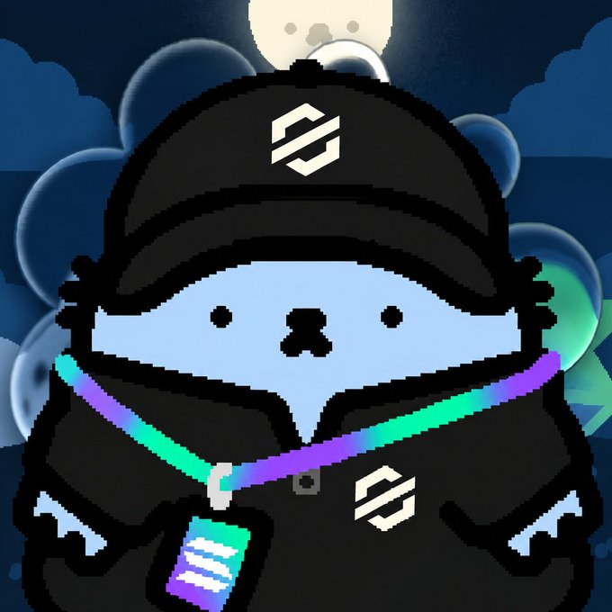 A pixel art illustration of a blue Yeti-like mascot wearing a black cap and hoodie, both featuring the Zashcoin (ZASH) logo, with a gradient Zashcoin tag around its neck.