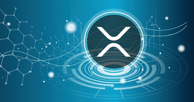 The image features a blue background with a white logo that reads "XRP". Below the logo, there are some text elements related to cryptocurrency and blockchain technology. The text mentions the benefits of the CLARITY Act, which could potentially impact the use of cryptocurrencies like XRP.