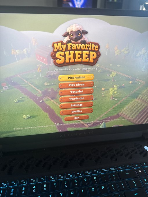 An Alienware laptop displaying the main menu of the video game 'My Favorite Sheep,' which shows a cartoon sheep logo and menu options including Play online, Tutorial, and Settings.