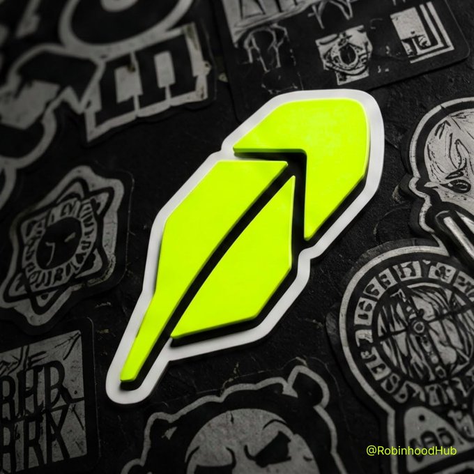 A neon green Robinhood feather logo sticker is displayed on a black surface covered with various other monochrome stickers, watermarked '@RobinhoodHub'.