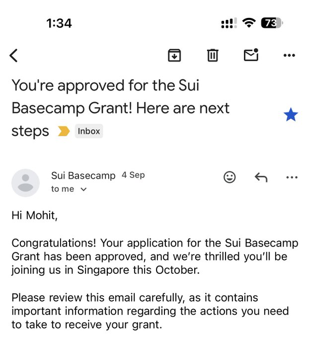 An email screenshot on a mobile device displaying an approval message for the 'Sui Basecamp Grant' sent to 'Mohit' from 'Sui Basecamp' on '4 Sep', informing the recipient about joining them in Singapore in October.