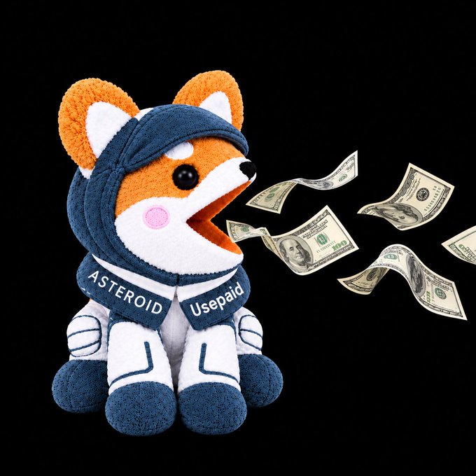 A plush toy dog wearing a blue and white spacesuit labeled 'ASTEROID' and 'Usepaid' with floating hundred-dollar bills.