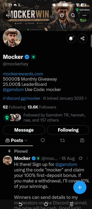 A Twitter/X profile screenshot for 'Mocker' (@mockerbey) featuring a pinned tweet promoting a 50,000$ monthly giveaway and 100% first-deposit bonus through the gambling platform Gamdom using the code 'mocker'.