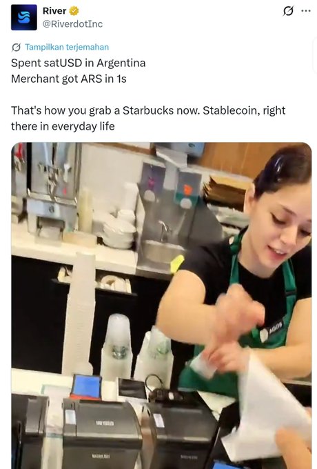 The image shows a woman behind a cash register at Starbucks, preparing to take payment from a customer. The customer is holding a paper receipt while the barista prepares their order. The background of the image features various items such as cups, bottles, and other objects typical of a coffee shop setting. The post on social media highlights how stablecoins are being used in everyday purchases, like paying for a cup of coffee at Starbucks. This demonstrates the increasing integration of digital currency into daily life and commerce.