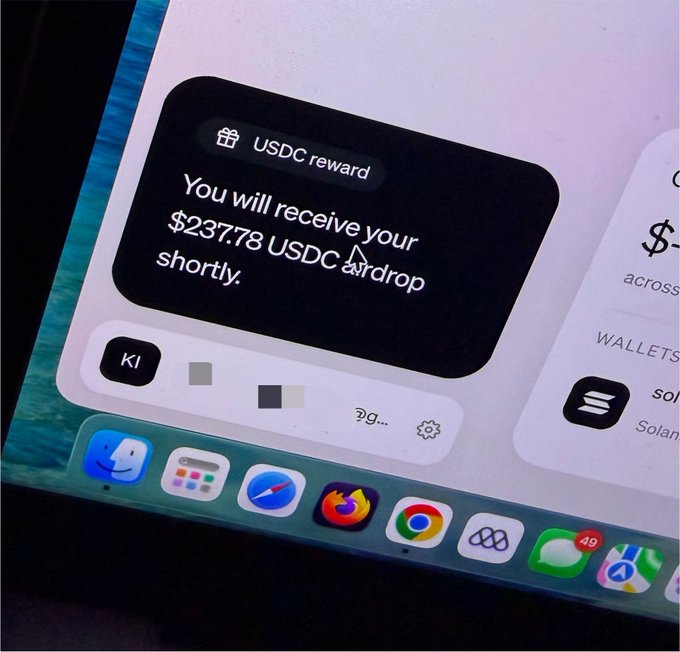 A notification on a phone screen displays "USDC reward: You will receive your $237.78 USDC airdrop shortly." The image relates to the post by showing the user's anticipation for Moonpay to deliver the promised USDC airdrop.
