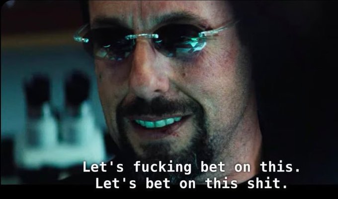 The image features a close-up of a man wearing sunglasses with a smug expression, captioned with the text "Let's fucking bet on this. Let's bet on this shit." This relates to the post's bullish prediction of price pullbacks to the 4-hour 50 EMA followed by a sustained two-week rally, expressing aggressive confidence in the trade setup.