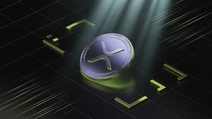 A physical coin featuring the XRP (or similar X-shaped) logo sits illuminated by a spotlight against a dark, grid-patterned background with glowing green pixel brackets, visually reinforcing the post's theme of low-cost cryptocurrency transactions. The coin's prominent symbol pairs with the caption's message highlighting XRP's minimal transfer fees compared to traditional bank wires.