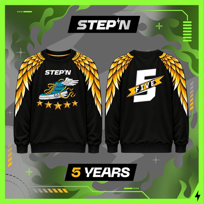 Promotional graphic for STEP'N featuring a black sweatshirt with golden wings design, displaying 'STEP'N' logo, a sneaker graphic, five stars, and 'FIVE' and '5 YEARS' text.