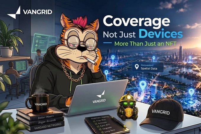 A promotional graphic for Vangrid reading 'Coverage Not Just Devices - More Than Just an NFT,' featuring a cartoon cat character with a laptop, a coin, and merchandise.