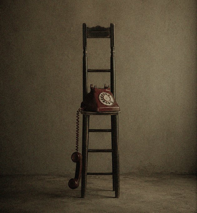 A vintage red rotary telephone with its receiver dangling off the edge rests on a tall, slender wooden chair against a muted, textured backdrop, evoking a sense of an unanswered or "missed" call. The nostalgic composition, paired with the moody atmosphere, visually reinforces the "Missed Call" concept referenced in the post.