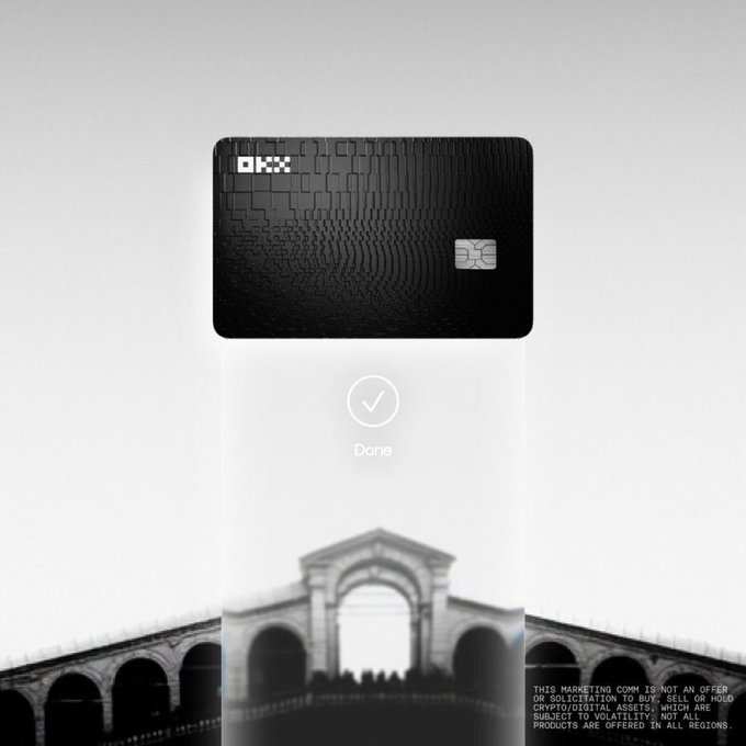 A black OKX credit card floats above a phone screen displaying a checkmark and 'Done,' with an architectural archway in the background and a disclaimer about the marketing communication not being a solicitation to buy, sell, or hold crypto/digital assets.