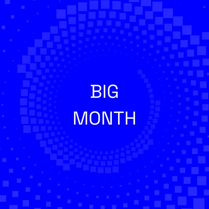 The image features bold white text reading "BIG MONTH" centered against a vibrant blue background decorated with a circular, pixelated pattern. This design visually reinforces the post's announcement that it's a "big month for Base," using simple, impactful typography to build excitement.