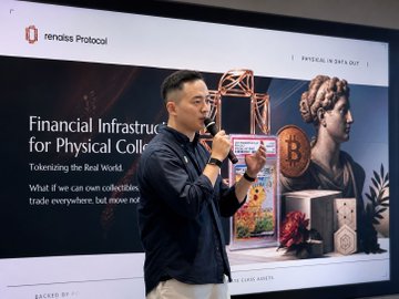 A man with glasses speaking into a microphone while presenting in front of a large screen titled 'nendex Protocol' about 'Financial Infrastructure for Physical Collectibles' - Tokenizing the Real World, featuring imagery of a classical statue and Bitcoin.