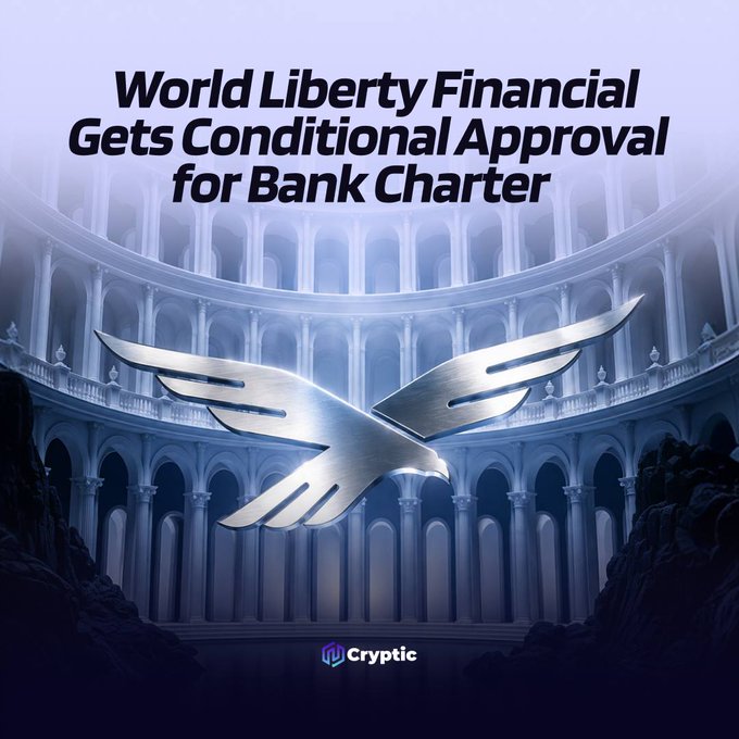 A dramatic graphic featuring a metallic bird emblem set against a grand, columned classical building, with the headline "World Liberty Financial Gets Conditional Approval for Bank Charter" and a "Cryptic" logo at the bottom. The image visually reinforces the post's news about World Liberty Financial (WLFI) receiving OCC conditional approval for a national trust bank charter, symbolizing the firm's elevated entry into the U.S. banking system.