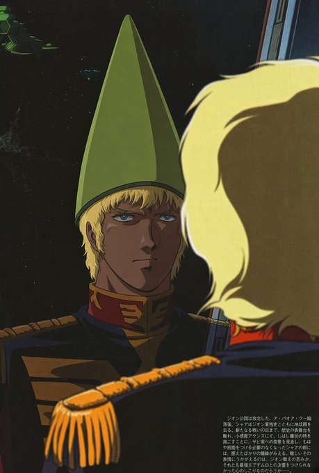 An anime illustration featuring a blonde character wearing a green conical helmet and military uniform facing another blonde character, with Japanese text at the bottom.
