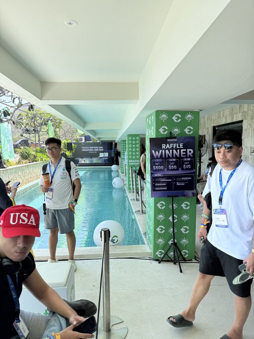 Participants enjoy a beachfront raffle event at Beach Horizon, where a sign announces a “RAFFLE WINNER” with prizes of $500, $50, and $10. The post thanks @JxSss0101okgc for joining and looks forward to the next event.