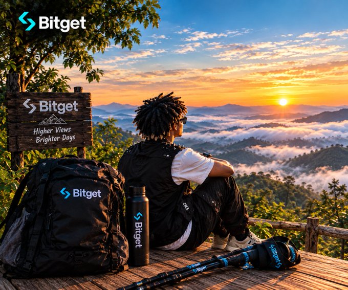 A Bitget cryptocurrency exchange advertisement showing a person with dreadlocks sitting on a mountain overlook at sunset with Bitget-branded backpack, water bottle, and hiking poles, accompanied by the slogan 'Higher Views Brighter Days'.
