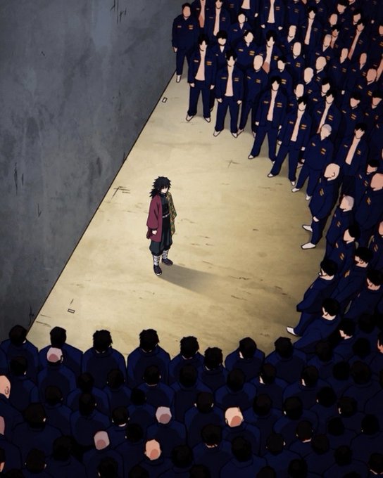 An anime-style illustration depicts a lone figure with messy dark hair standing in the center of a large room, surrounded by a crowd of people in dark blue uniforms.