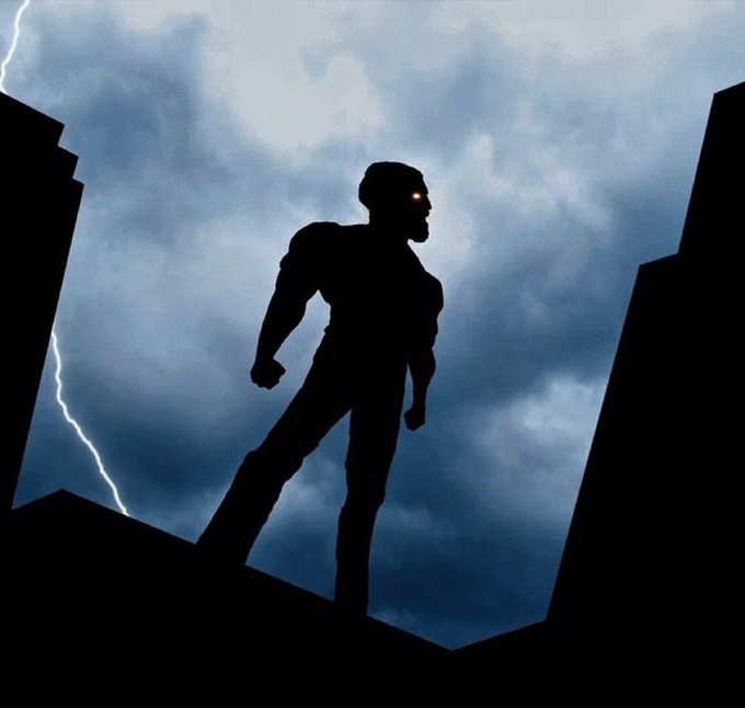 A silhouette of a muscular figure standing on a rooftop against a stormy sky, with glowing red eyes and lightning striking in the background.