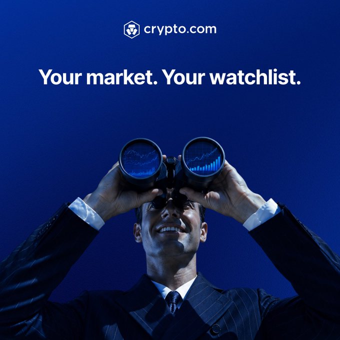 A smiling man in a suit holds binoculars to his eyes, with the lenses displaying cryptocurrency price charts and graphs against a dark blue background. The Crypto.com logo appears at the top above the tagline "Your market. Your watchlist," visually reinforcing the post's message about tracking favorite assets in one place via the app's Watchlist feature.