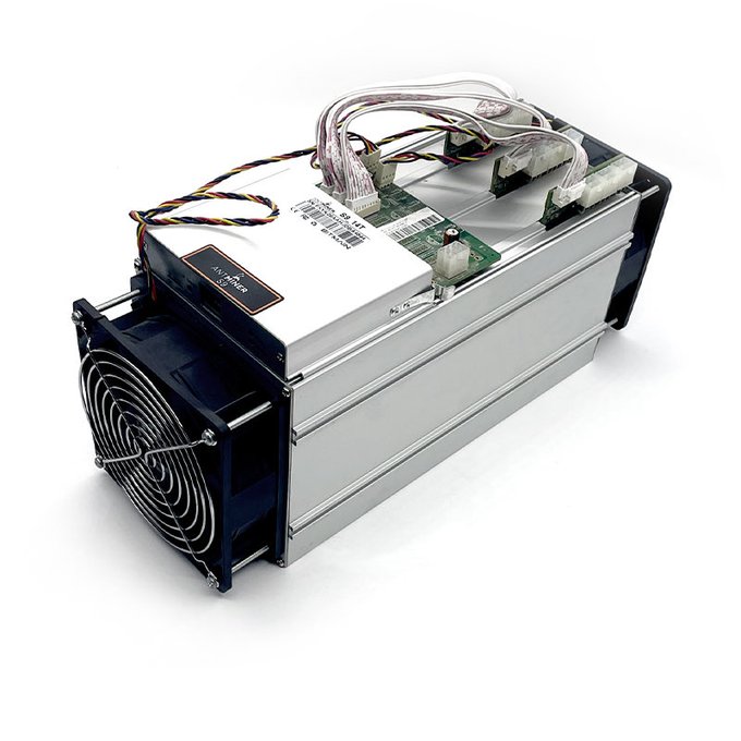 The image features a white and silver Bitcoin mining machine with multiple wires attached to it. The text "On this day in history 10 years ago" suggests that the machine was released ten years prior, which indicates its significance in the world of Bitcoin mining. The machine is described as a "mainstream bull run" machine, implying that it played an essential role in the Bitcoin mining industry during that period.