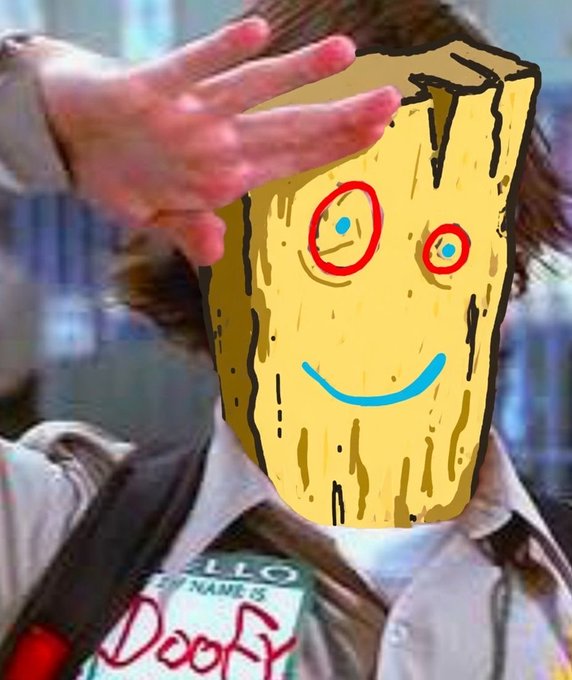 A person with a digitally drawn, smiling piece of toast face obscuring their actual face holds up their hand in front of the camera, wearing a shirt that reads 'IF MY NAME IS DocFX'.