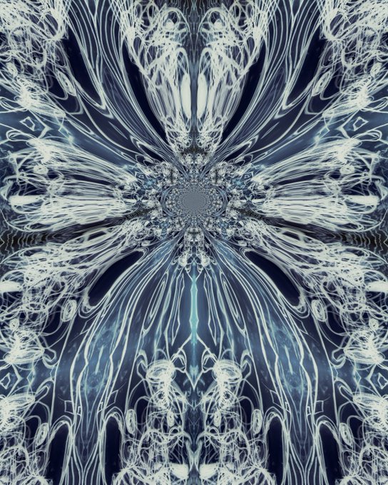 A symmetrical, kaleidoscopic digital artwork featuring intricate, mirror-like patterns radiating from a central point, rendered in icy blues and whites with swirling, tendril-like filaments that evoke a frozen cosmic portal. This visual aligns with the post announcing the collection of "mirror universe 20" by @embii4u on @objktcom, reflecting the piece's title through its fractured, reflective symmetry.