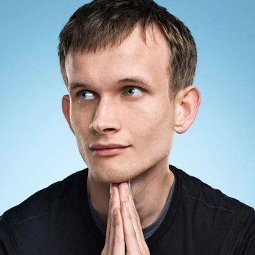 A young man with short brown hair looks off to the side with his hands clasped in a contemplative gesture, set against a blue background—visually representing deep thought and concern, fitting the post's warning from Vitalik Buterin about AI threatening cryptography within two years.