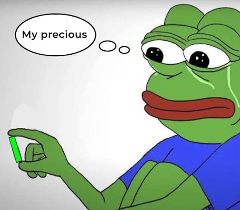 A cartoon illustration of the Pepe the Frog meme character looking adoringly at a small object in his hand while thinking 'My precious,' referencing Gollum from The Lord of the Rings.